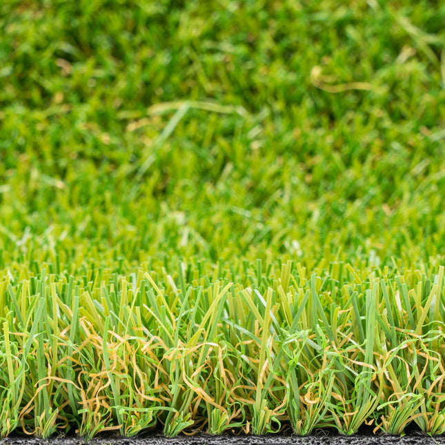 Close-up van Kunstgras Select 5 met realistische groene en beige vezels